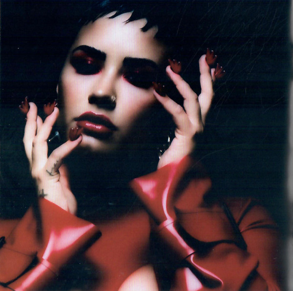 Demi Lovato — Holy Fvck CD packaging: booklet photograph — red gloves close-up