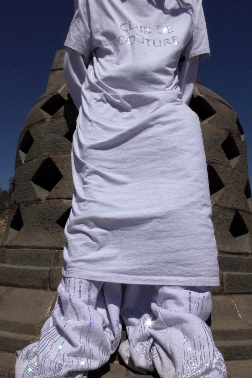 Hood By Air — Trust Exercise, white couture dress over monogram trousers, by the stone monument