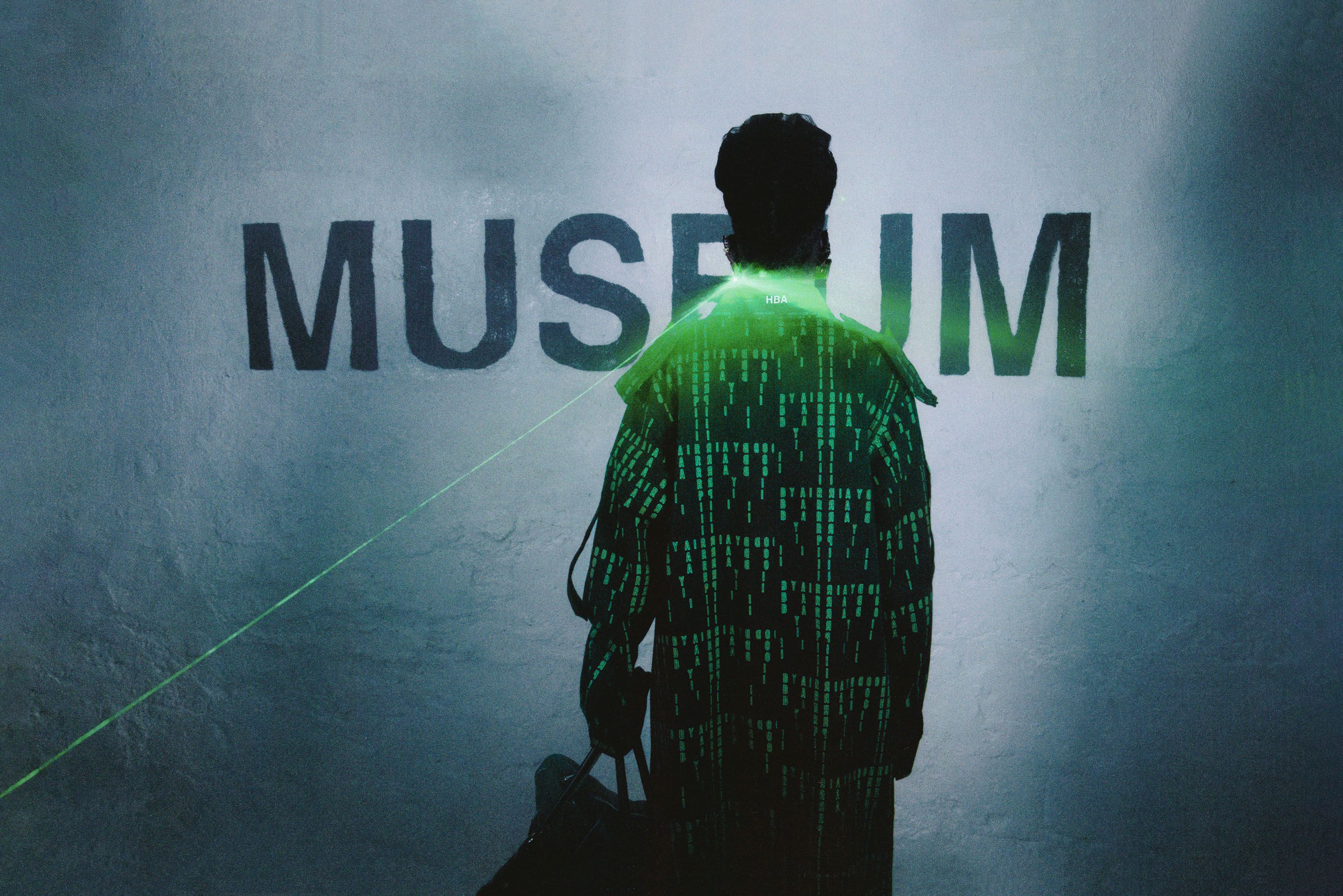 Hood By Air — Museum, back view, the green code lit by a laser beam