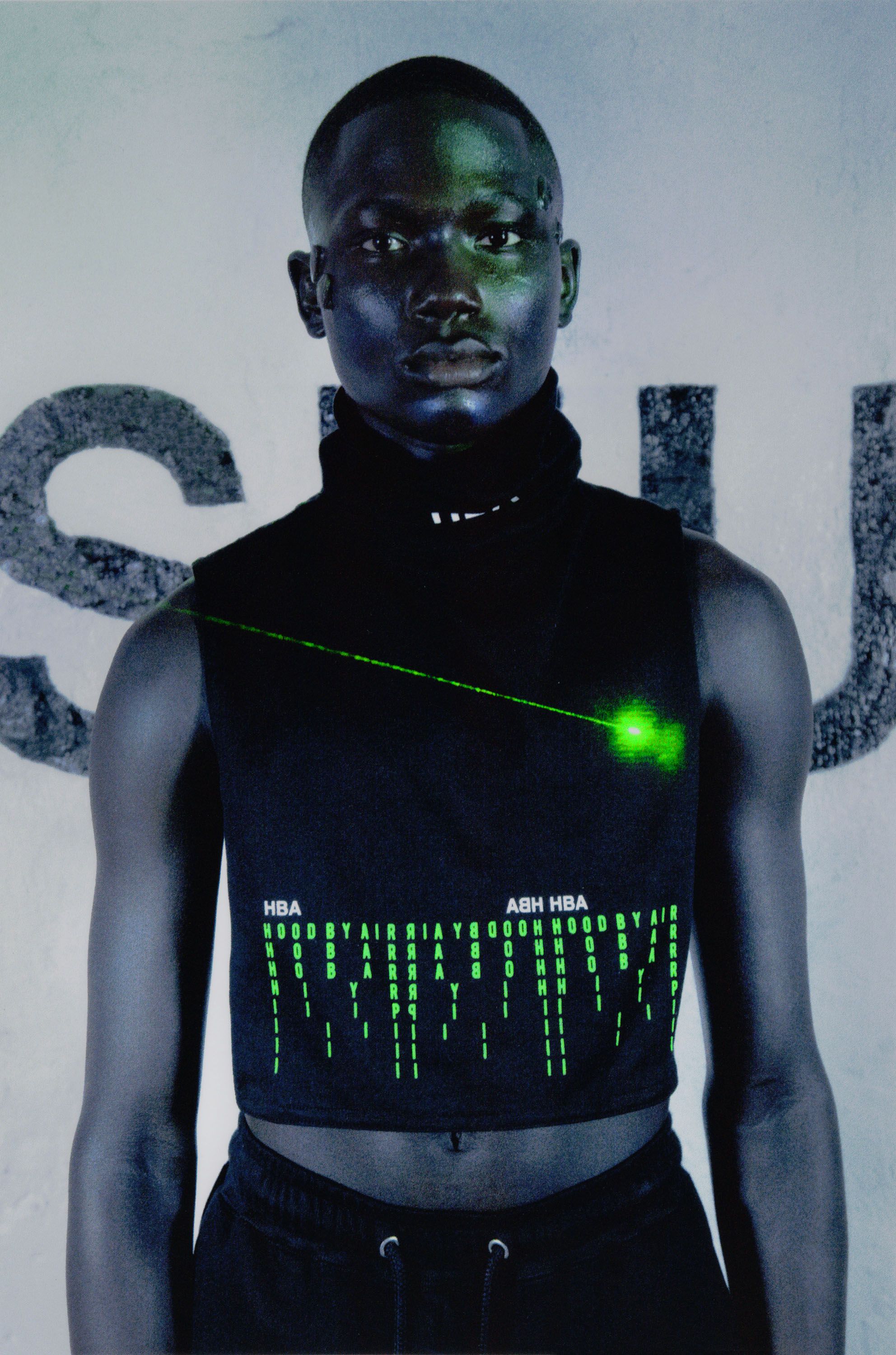 Hood By Air — Museum, portrait in a black vest, a laser beam across the chest