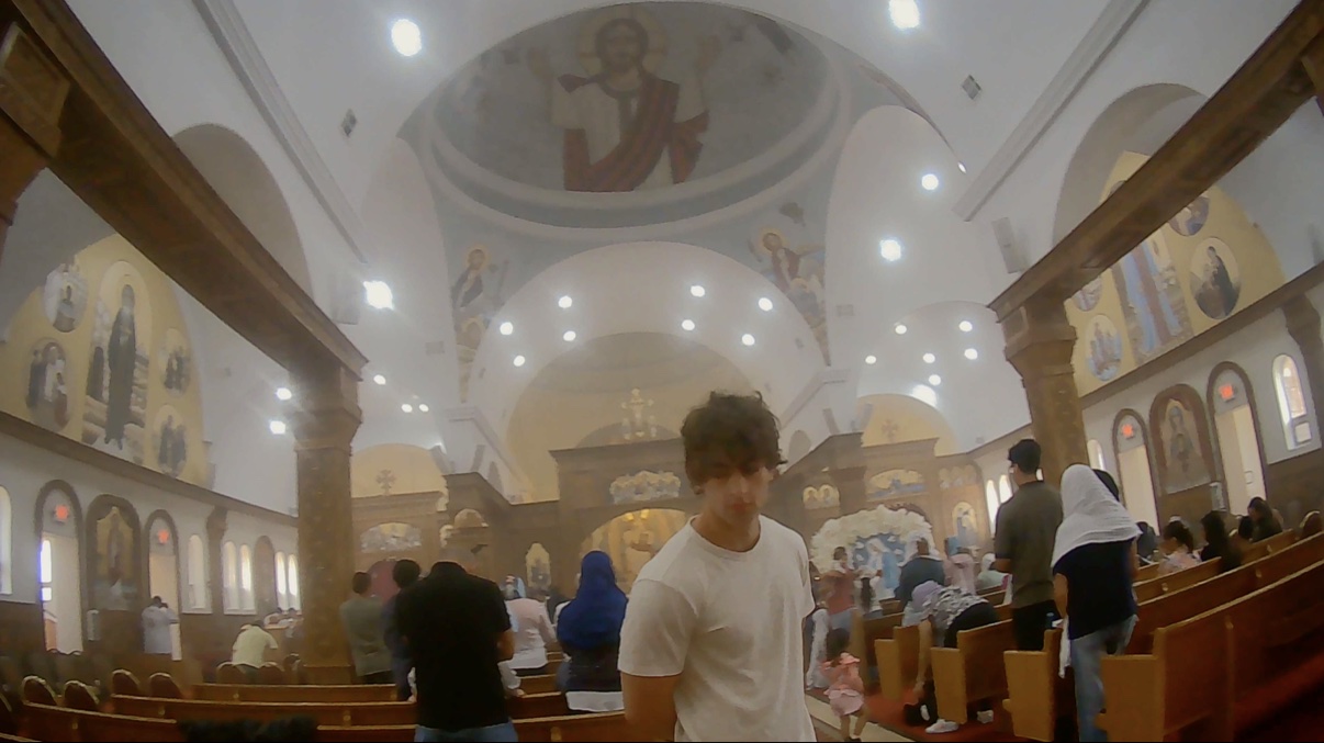 Ian — standing in a church
