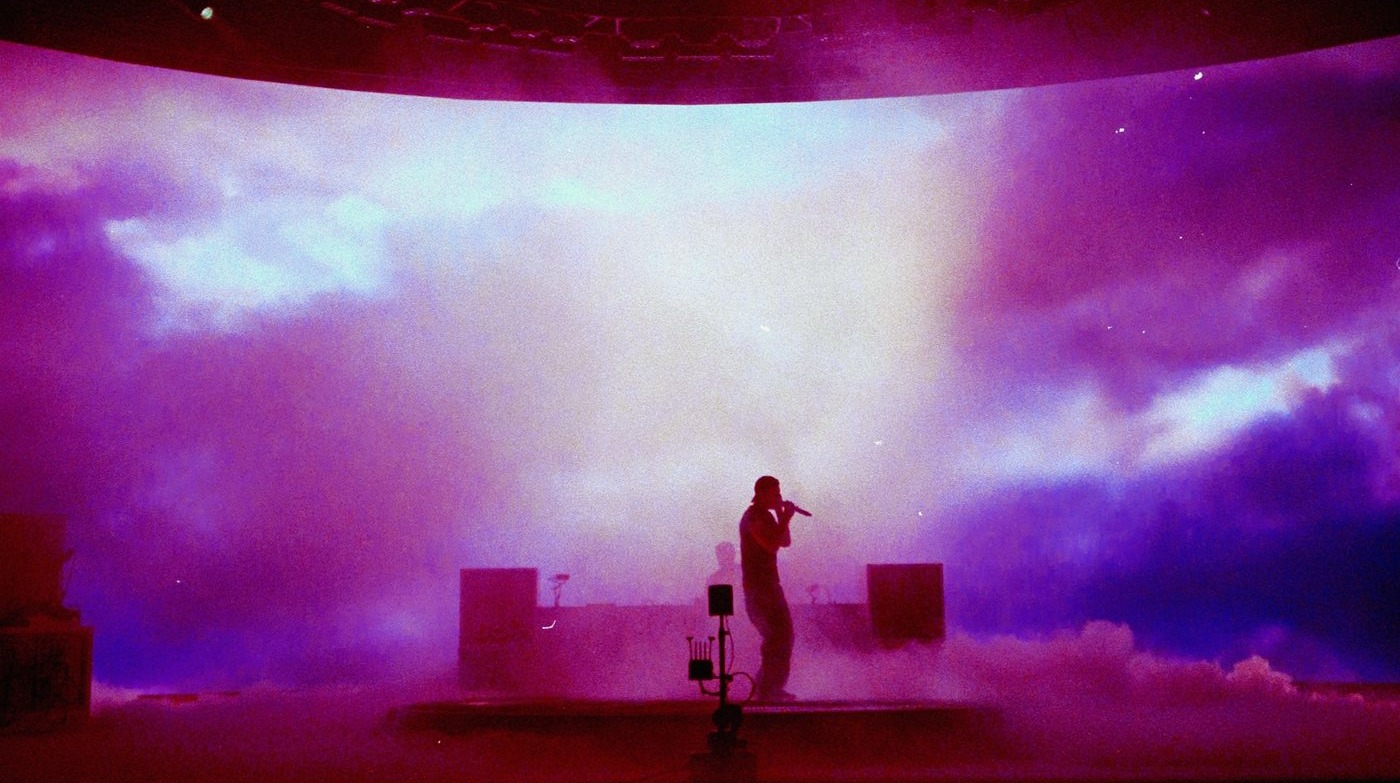 The Kid Laroi — A Perfect World live, magenta cloud screen. Photo: Adam Kargenian