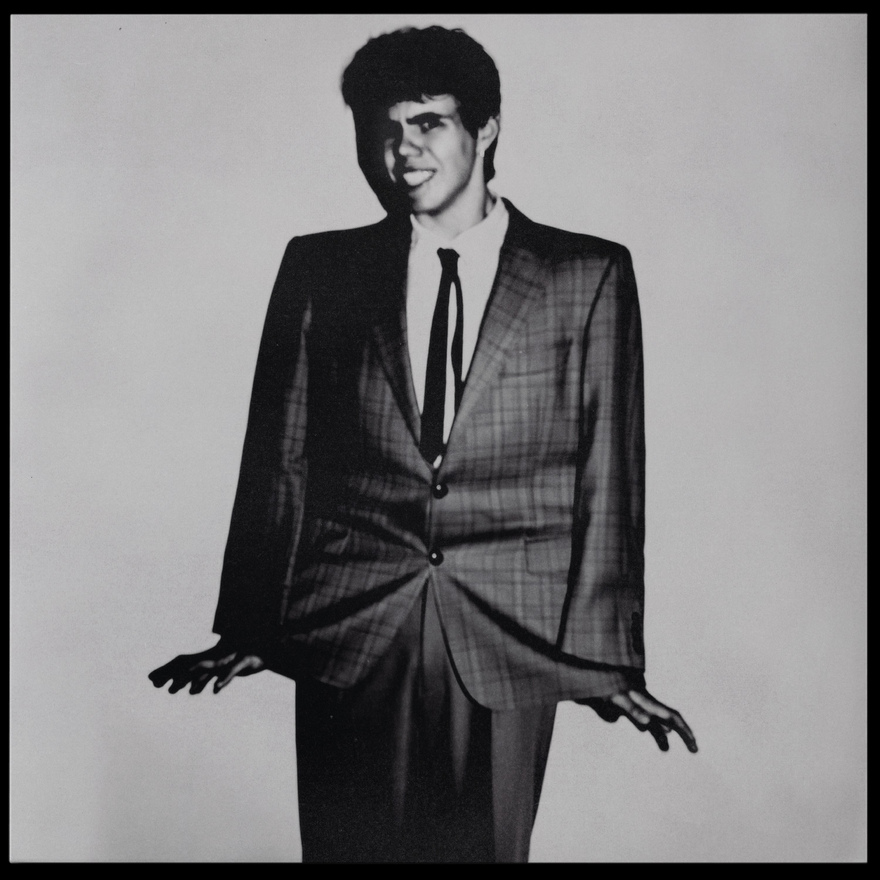 The Kid Laroi — Before I Forget vinyl poster, black-and-white plaid-suit portrait
