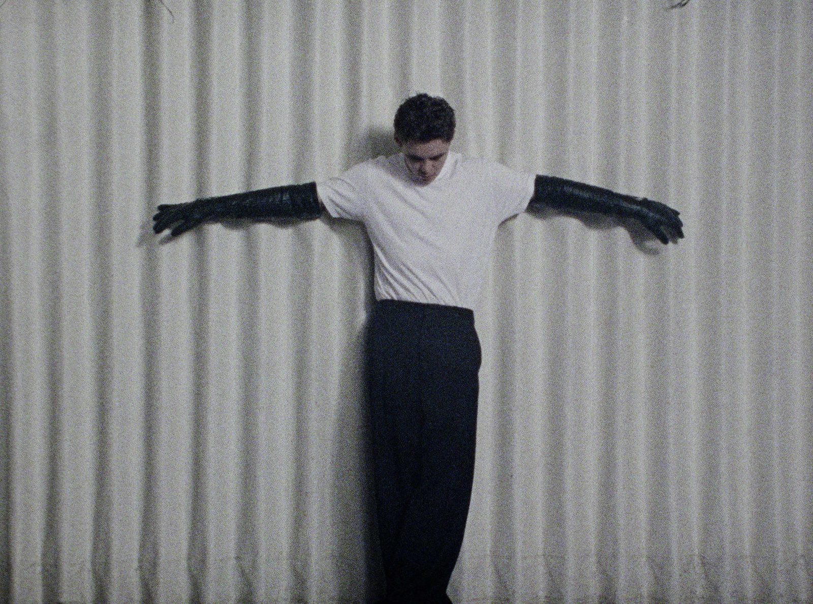The Kid Laroi — film still, against the curtain