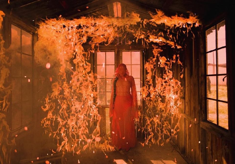 Noah Cyrus — burning cabin artwork