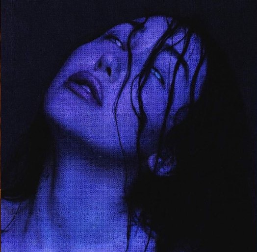 Noah Cyrus — blue-lit portrait