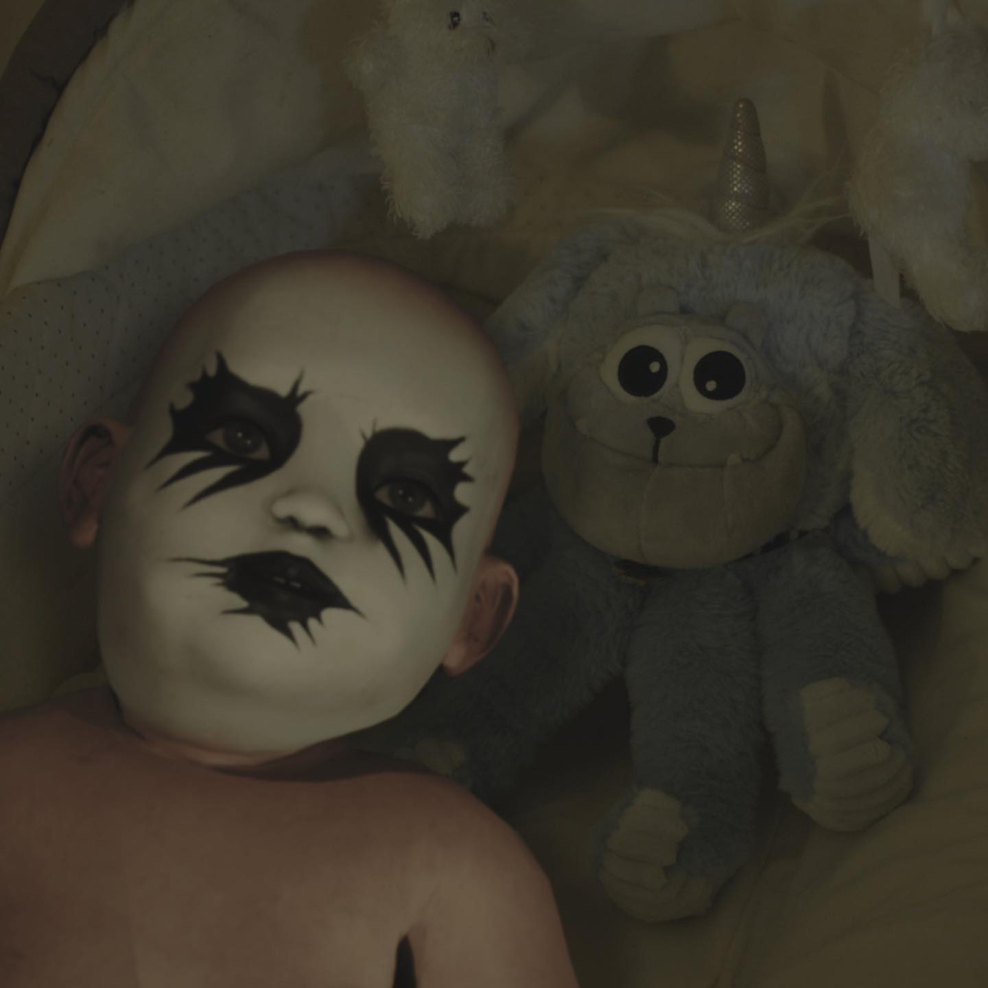 Shlohmo — Heaven Inc., face-paint doll with a plush toy
