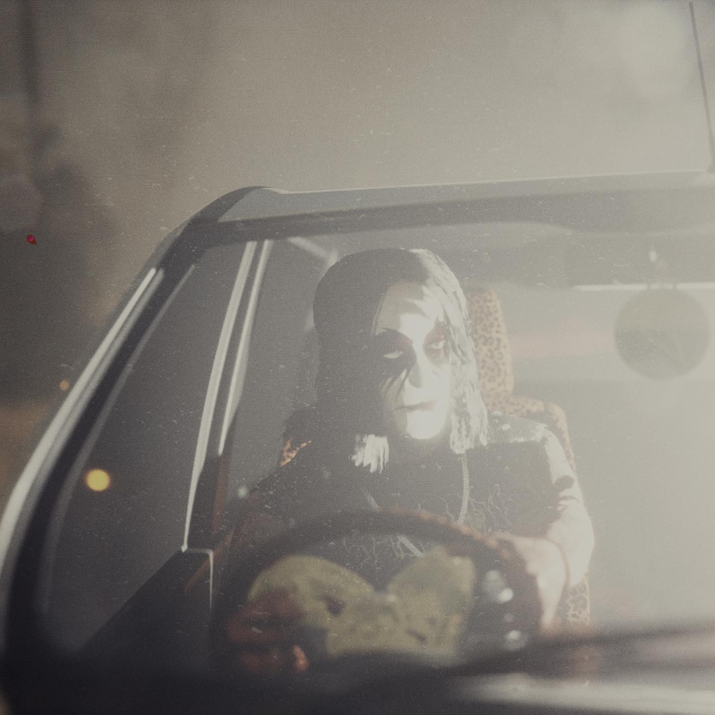 Shlohmo — Looking at Plants, driver seen through a windshield