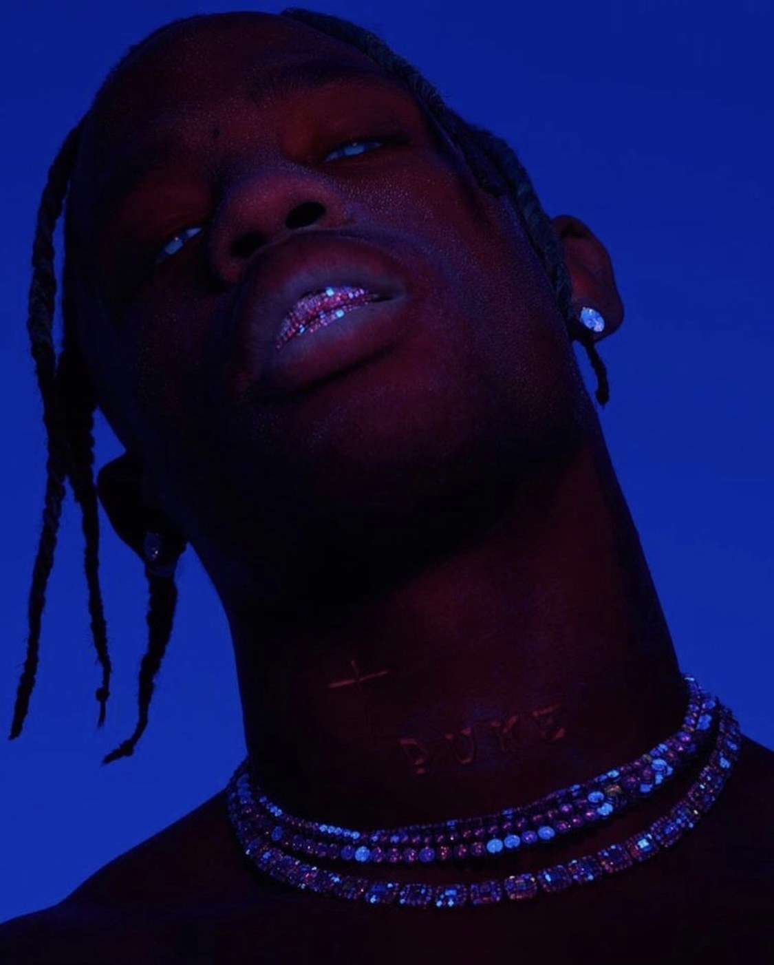 Travis Scott — portrait in blue and red light
