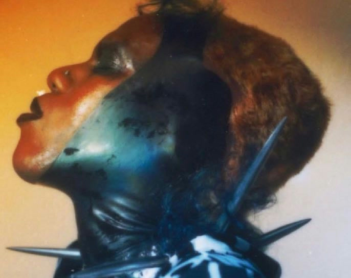 Yves Tumor — portrait, spiked collar in profile